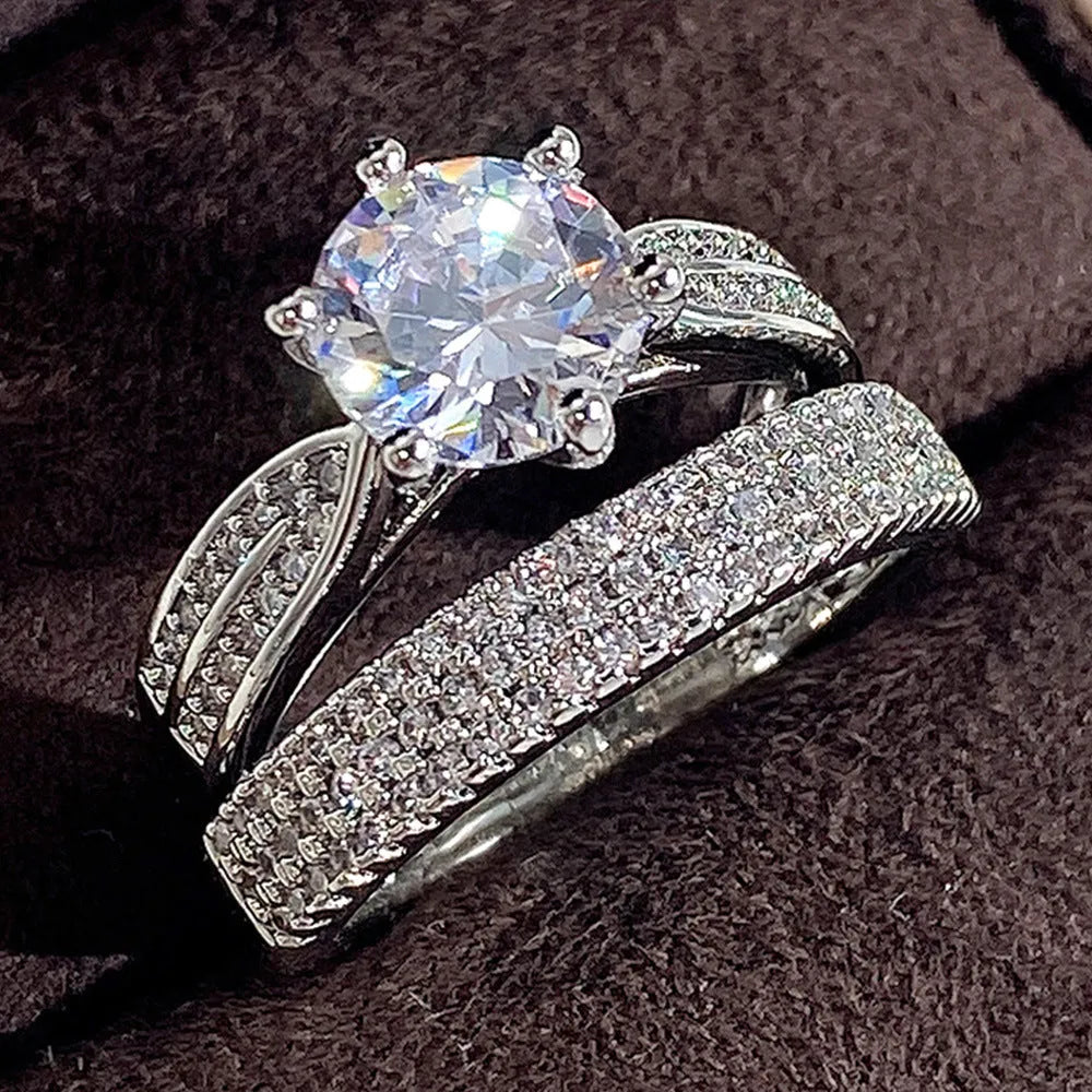 White gold colour alloy combined wedding ring and simple geometric bracelet.