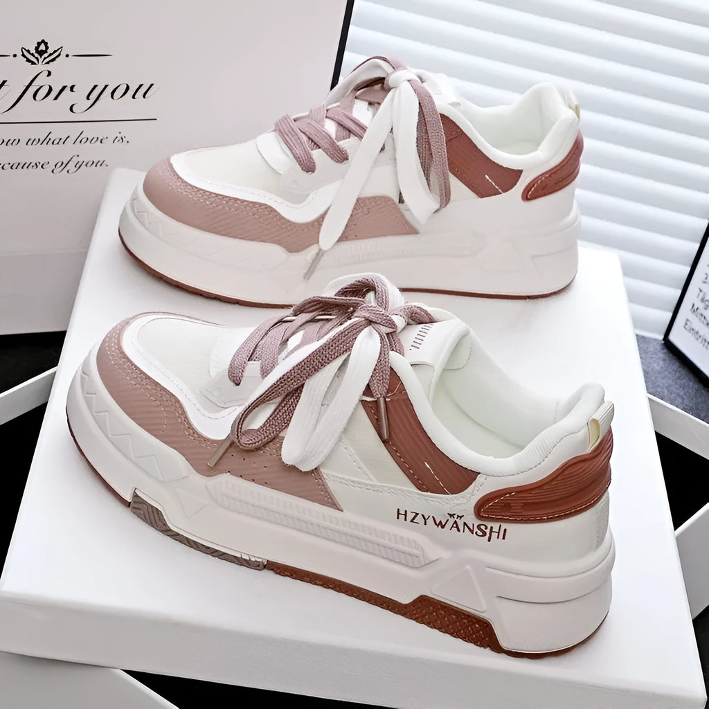 Children's beige board shoes with thick rubber sole, lace-up front, and cross shoulder straps.