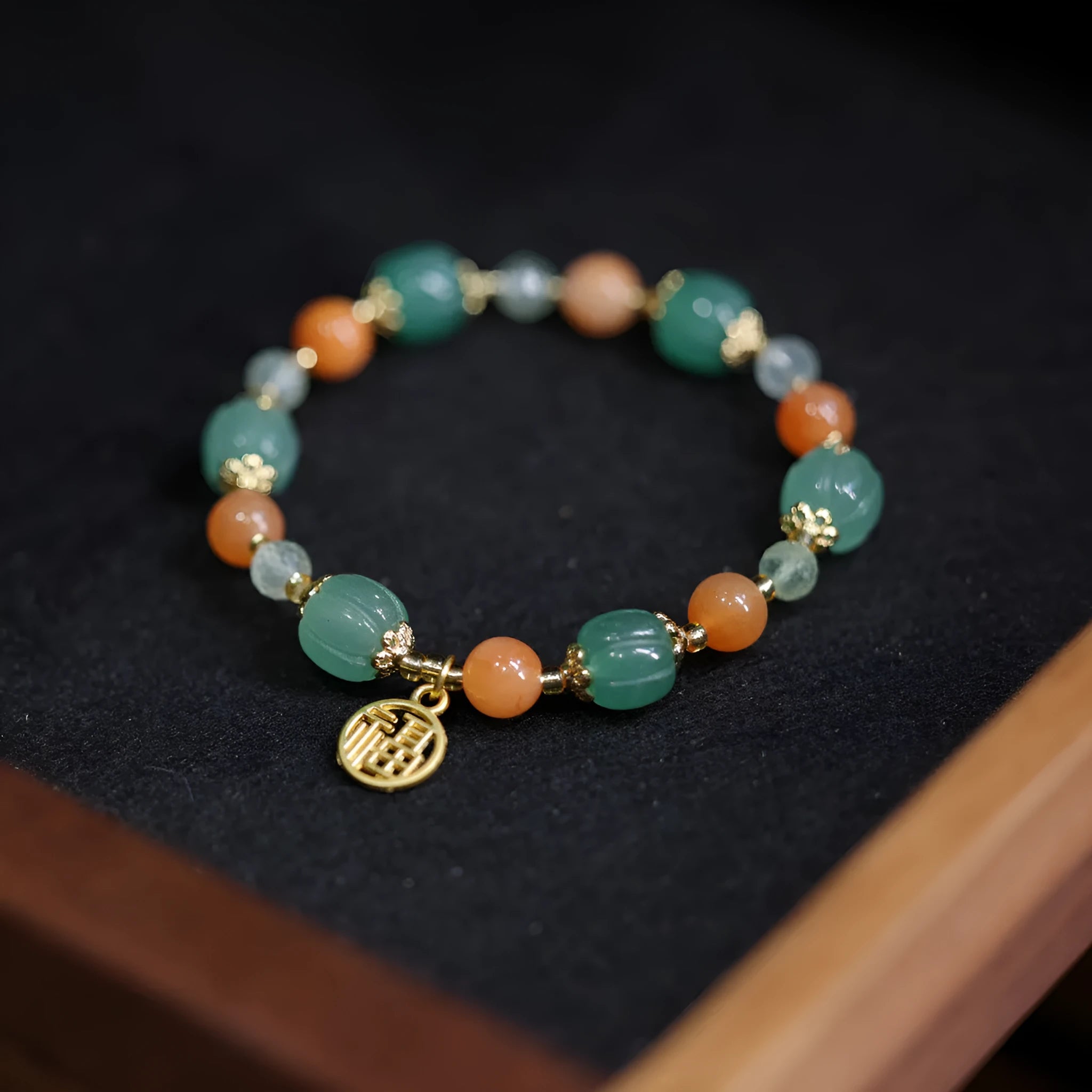 Jinsi Jade Duobao pumpkin bracelet with 9x10mm beads and Prehnite accents for 14-16.5cm wrists
