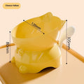 Oblique stainless steel cat bowl in yellow colour with a non-slip base.