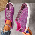 Women's plus size black lace-up board shoes with round toe and flat rubber sole.