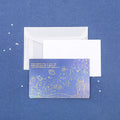 Set of three bronzing finish folding greeting card envelopes in four colour styles, measuring 13cm by 8.5cm.