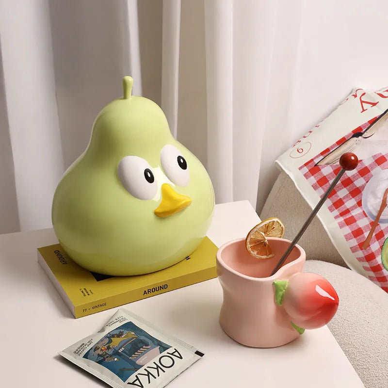 Pear-shaped ceramic tissue box holder with animal design in green or black