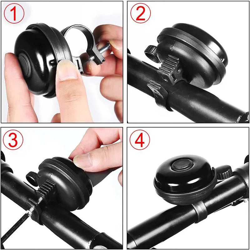 Black ABS plastic bicycle bell with 58mm diameter on a mountain bike handlebar fixture