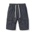 Men's multi-pocket loose cropped pants in dark blue polyester fabric for summer outdoor wear