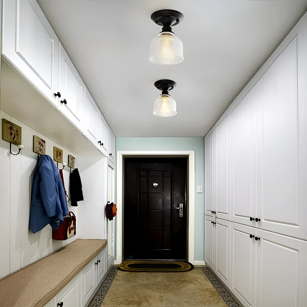 American retro single-head ceiling lamp with clear glass shade showing exposed filament style