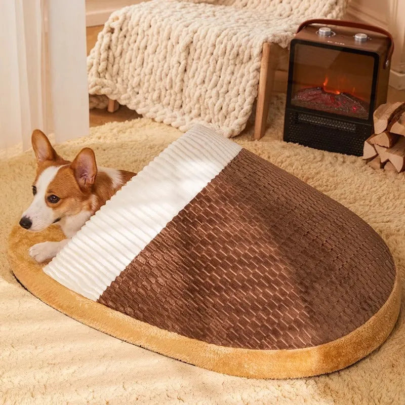 Blue dog nest sleeping bag with removable cover, shown with a small dog inside, fleece lining visible.