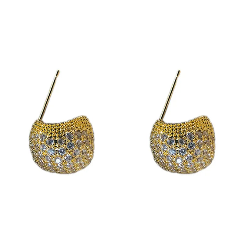 Geometric drop-shaped earrings with golden beans ear clip design in gold and white colours