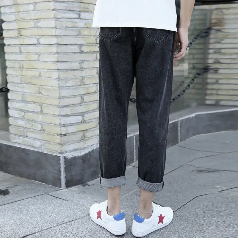 Men's black and blue straight leg cotton jeans with small harem style on waist size chart