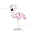 Pink crystal flamingo decorative ornament in modern style on table