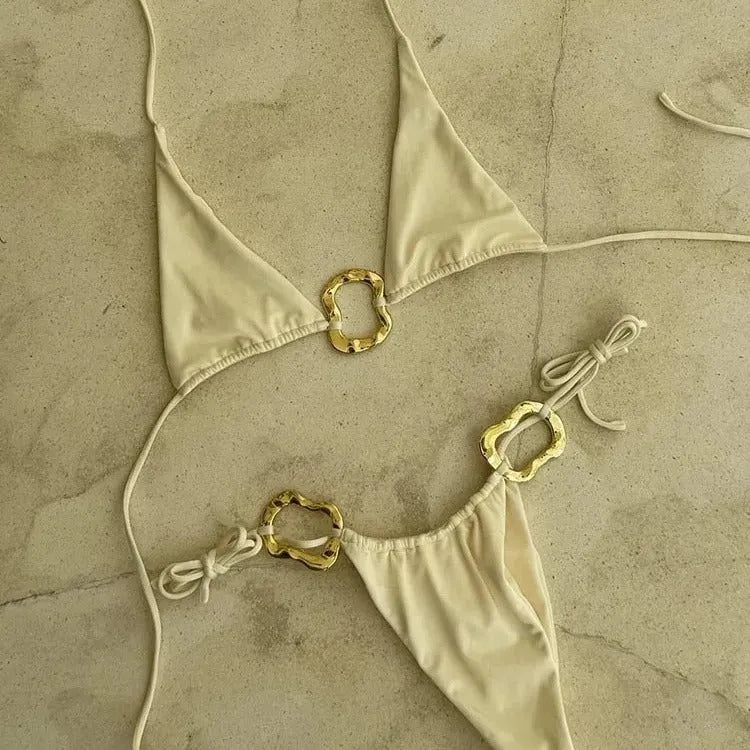 Women's bikini set with halter top and lace-up low waist briefs in solid colour
