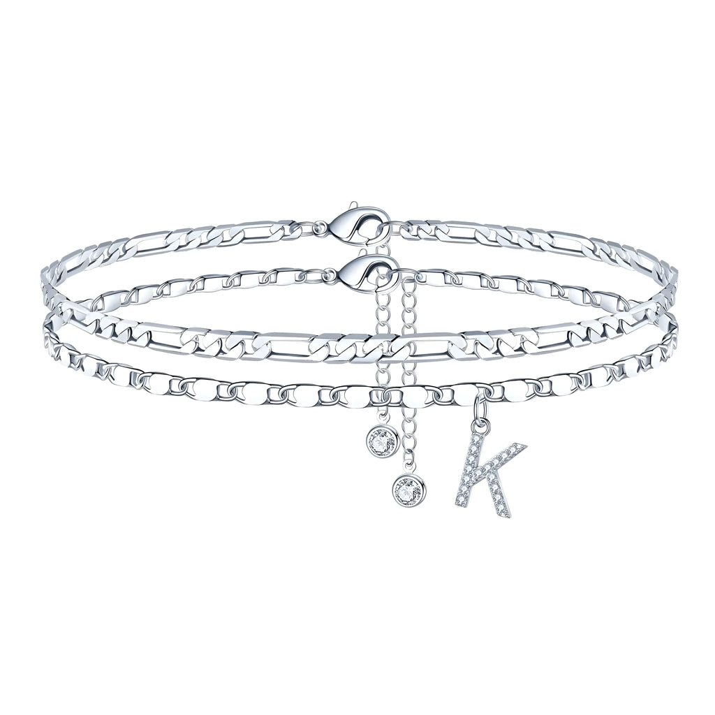 Silver-coloured copper anklet with a double-circle bead engraved with a letter.