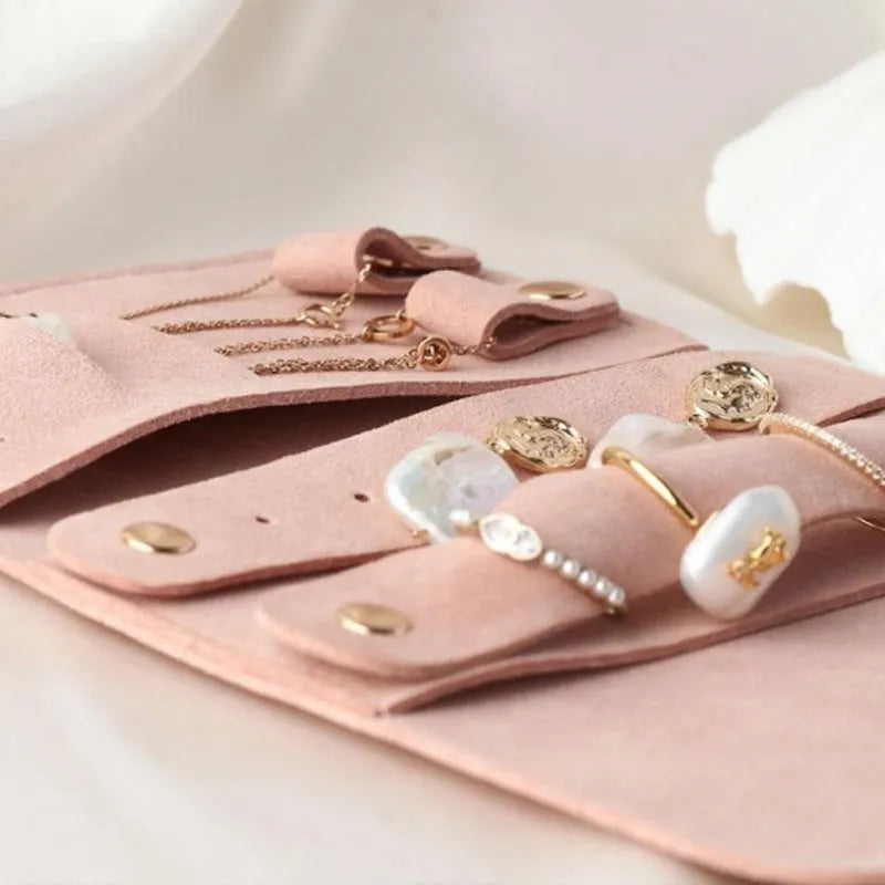 Brown PU leather jewellery storage bag with microfiber lining, measuring 12cm by 12cm.