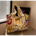 Canvas shoulder tote bag with printed design, large capacity for shopping and travel