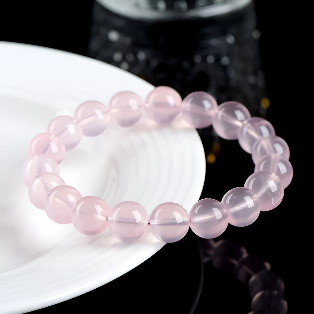 Natural polished crystal round bead bracelet in pink, shown in a single circle configuration with various bead size options.