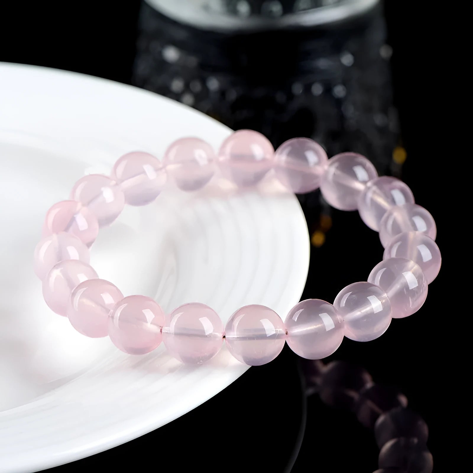 Natural polished crystal round bead bracelet in pink, shown in a single circle configuration with various bead size options.