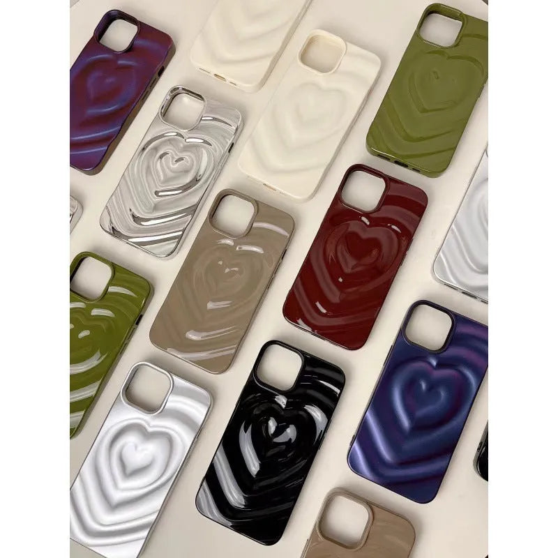 Solid colour TPU iPhone case with a raised 3D love design in bright purple.