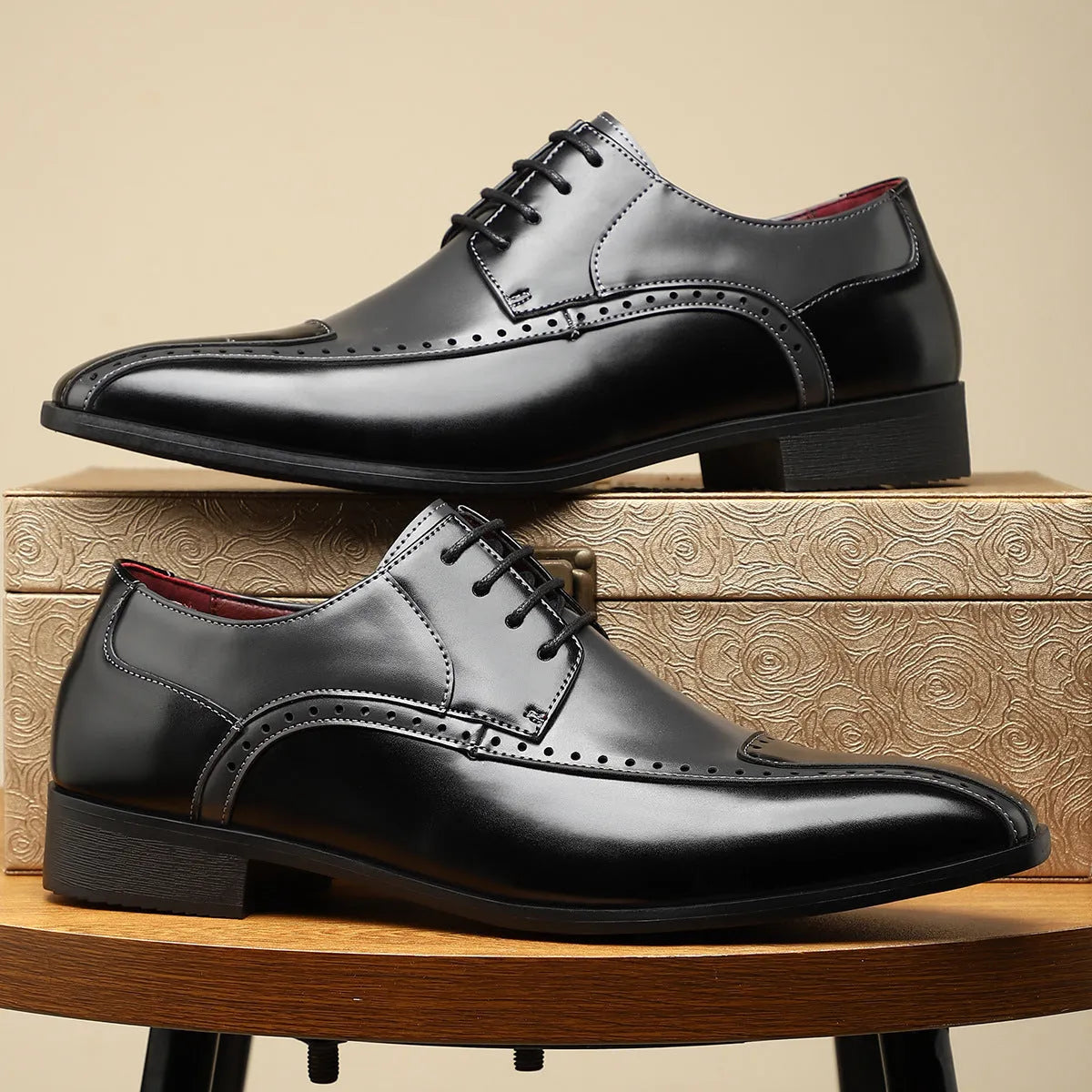 Men's black leather-style low-top shoes with a leather toe cap and stitching detail on a breathable PU upper.