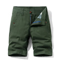 Men's khaki cotton casual overalls with straight leg and zip fly on a neutral background.