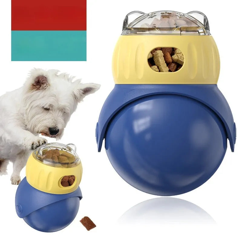 Yellow and blue plastic owl-shaped tumbler puzzle feeder cat toy on a flat surface.