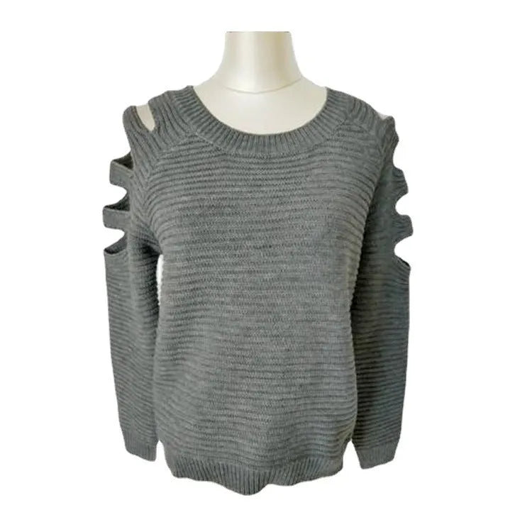 Women's grey crocheted hollow-out long sleeve knit shirt with round neckline on a mannequin