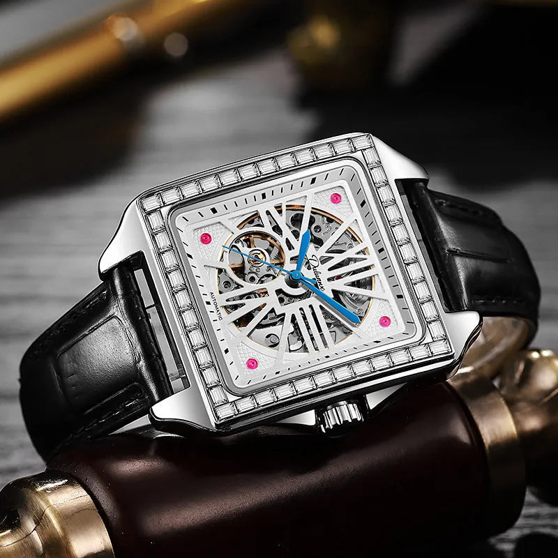 Men's square-faced automatic watch with diamond-studded case on a choice of strap.
