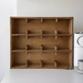 Solid birch wood cup storage rack with multiple square grids in natural meridian colour