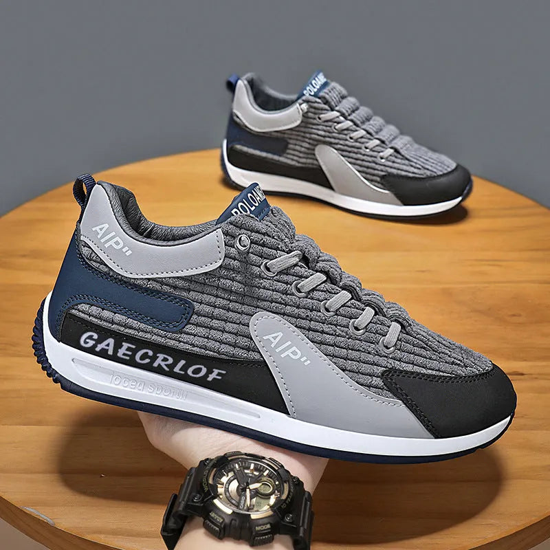 Men's green and grey mesh running shoes with lace-up front and viscose sole