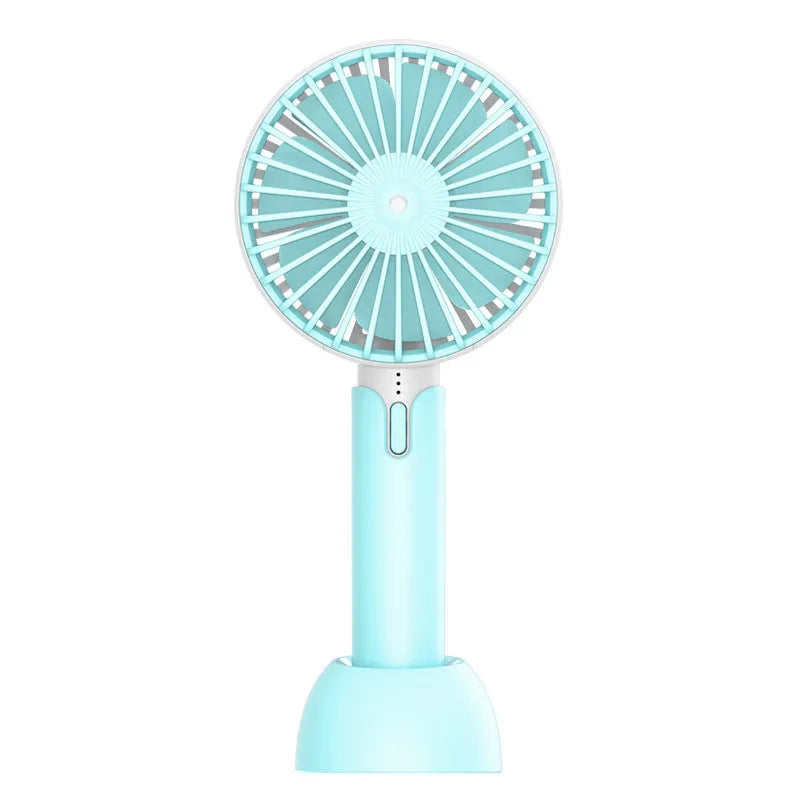 Blue handheld mini USB fan with 3-speed buttons on a desktop.