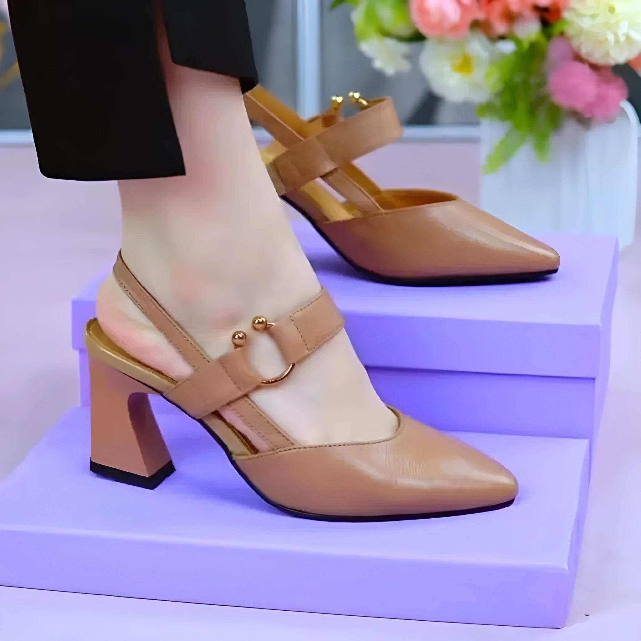 Women's apricot-colour leather sandals with a closed toe, open back, and a chunky high heel.