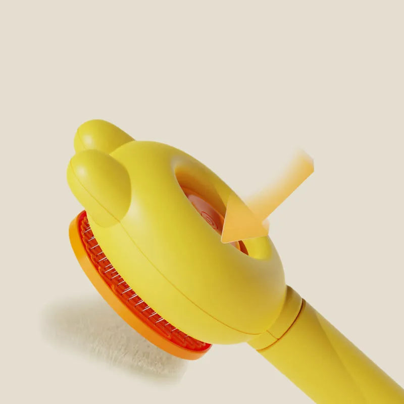 Green self-cleaning cat brush with release button and metal comb for pet grooming