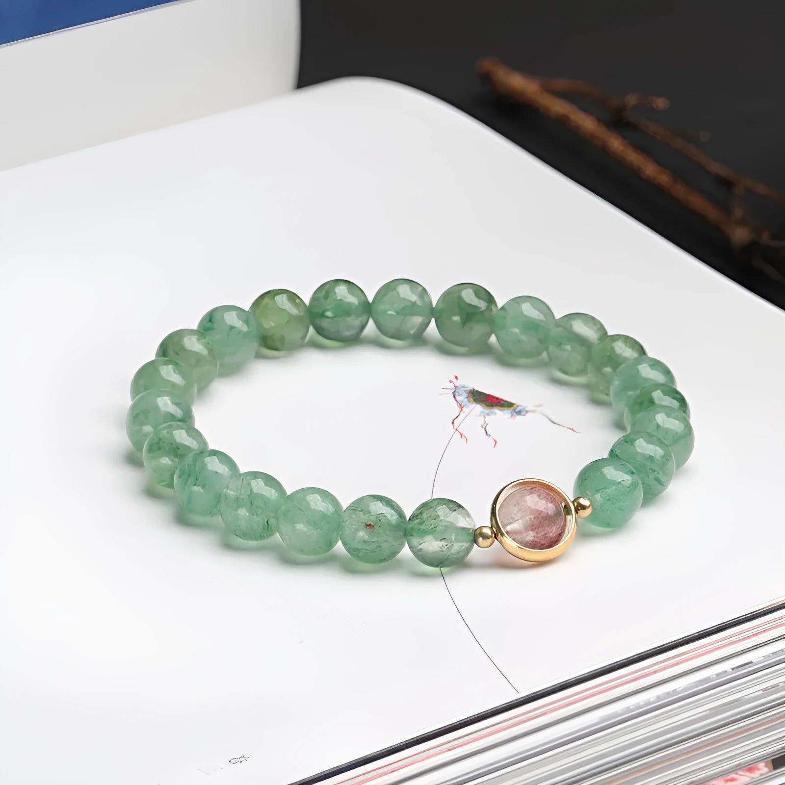 Green strawberry quartz bracelet with hand-woven 7.5mm beads and Chinese auspicious patterns