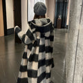 Beige and black plaid mid-length loose fit polyester women's winter woolen coat with lapel collar on a model