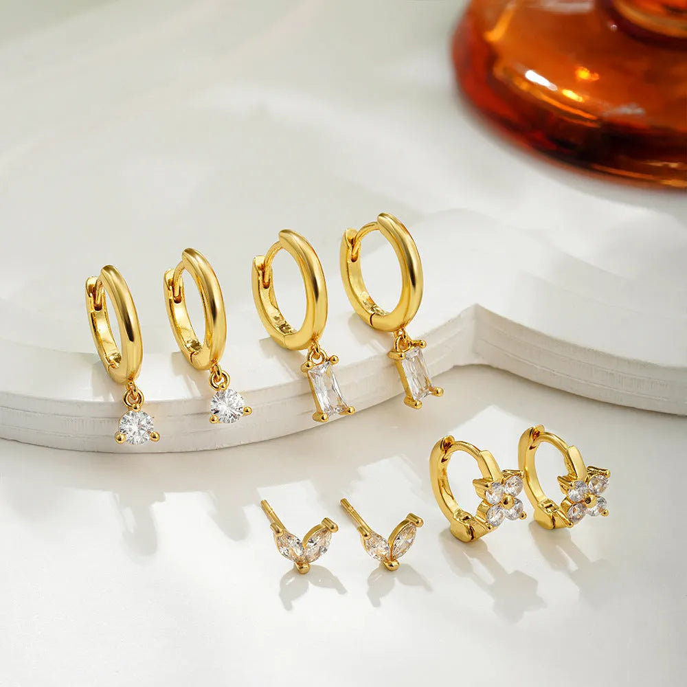 Geometric square zircon four-piece earrings set in gold or silver electroplated finish on copper