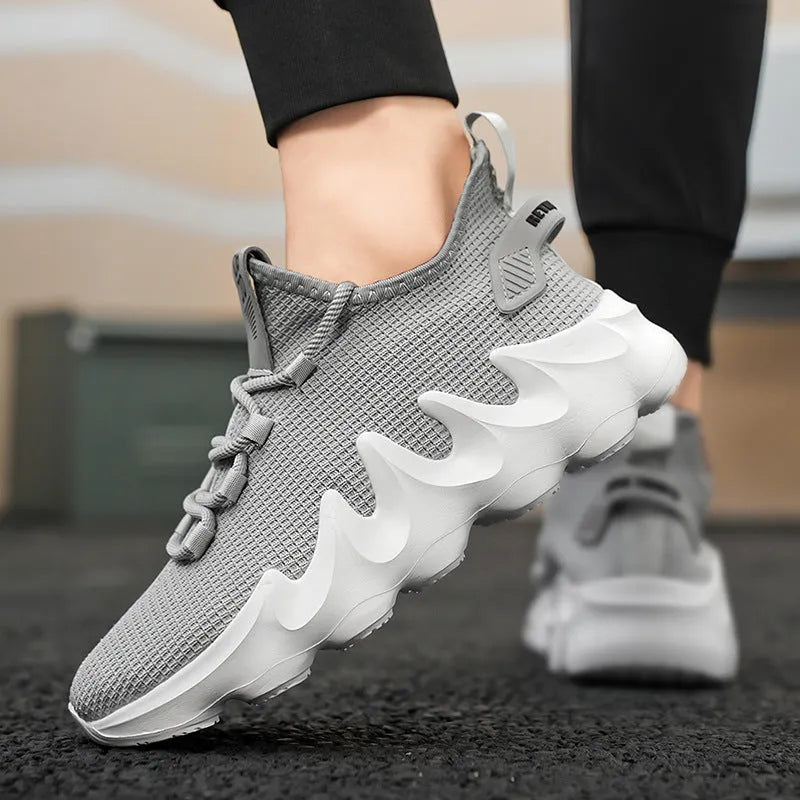 Men's black lightweight sock-like sports shoes with lace-up front and round toe on wear-resistant sole.