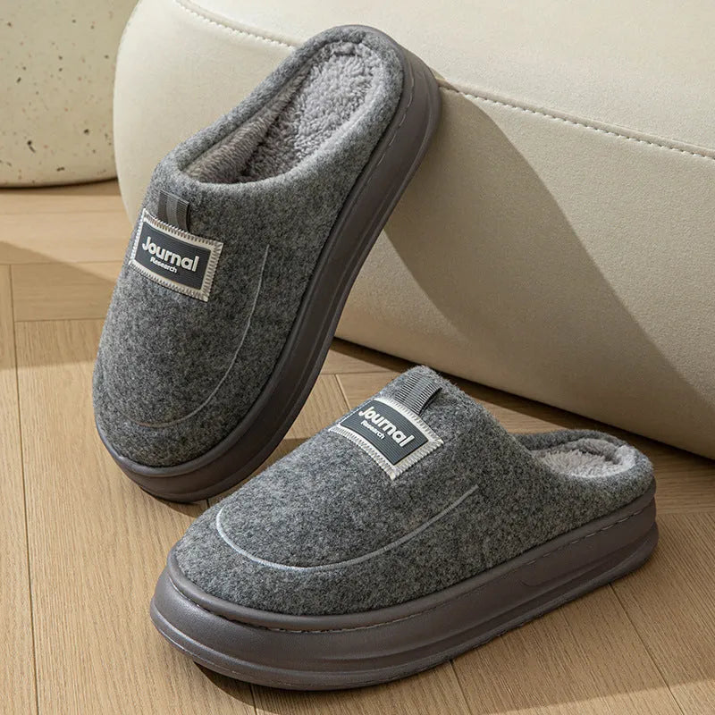 Men's brown and grey suede slippers with a thickened sole, shown from the side.