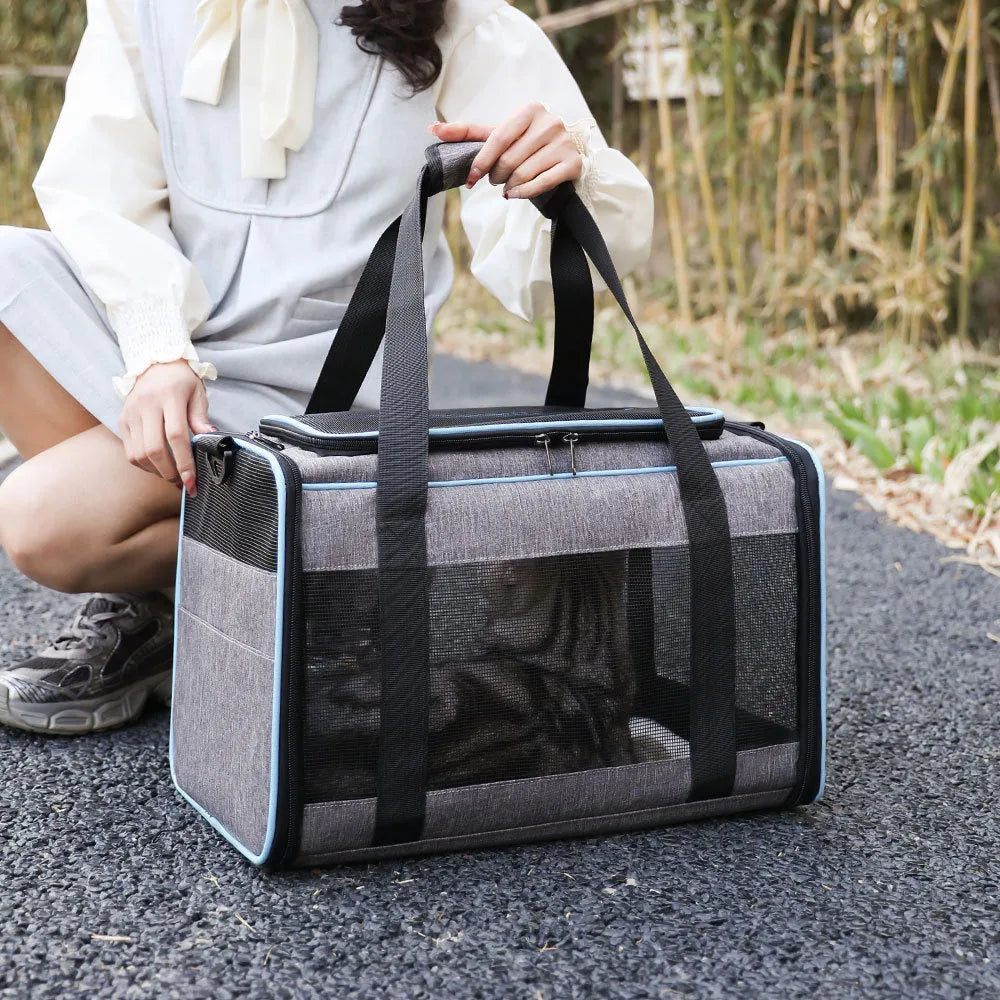 Oxford fabric pet carrier bag for dogs and cats in grey with blue edge measuring 44cm long