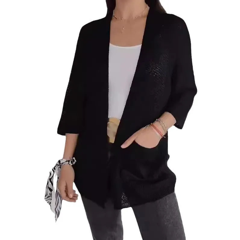 Women's waffle knit cardigan coat in apricot colour with nine-quarter sleeves and side pockets