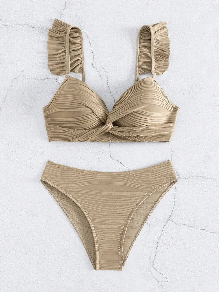 Women's solid colour bikini swimsuit in black or khaki on a mannequin.