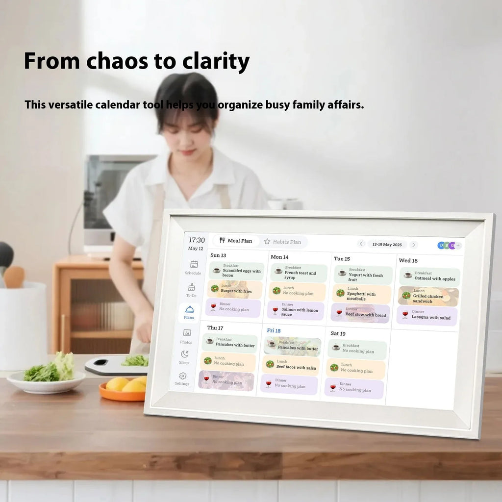 White smart digital photo frame with 15.6 inch screen displaying family photos