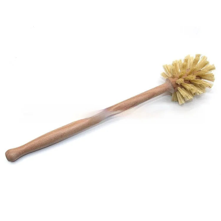 Large long handle cleaning brush with beech wood handle and natural sisal bristles on a wooden surface