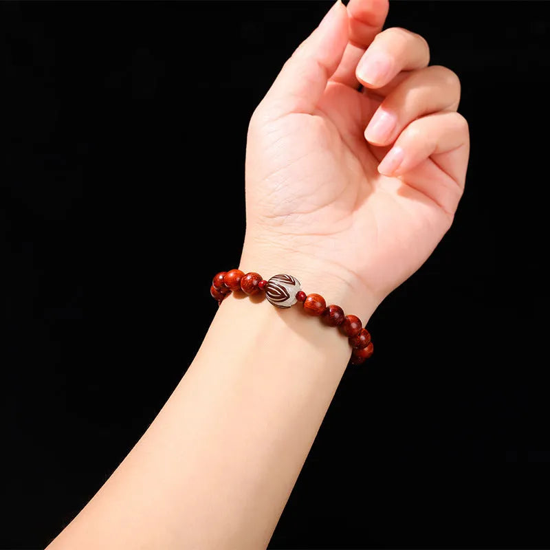 Red rosewood and grey jade Bodhi Lotus bracelet with geometric round beads.