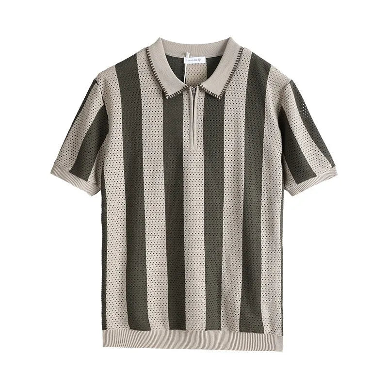Man wearing a striped short sleeve blue sweater with silver zipper details on the front.
