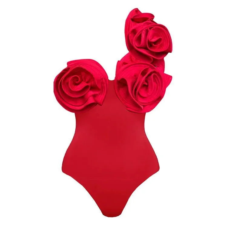 Solid red women's sleeveless one-piece swimsuit on a hanger