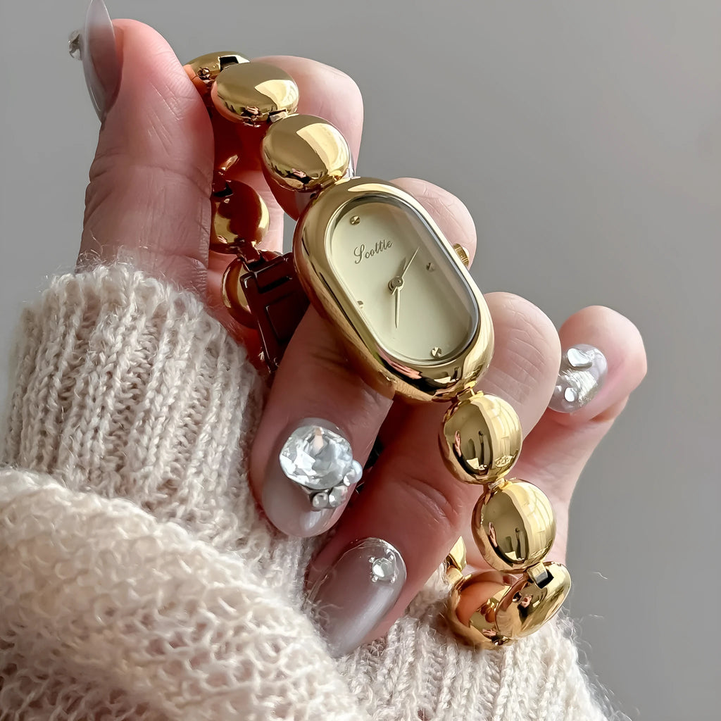 Women's oval gold-plated fashion watch in seven colour options with 9mm case thickness