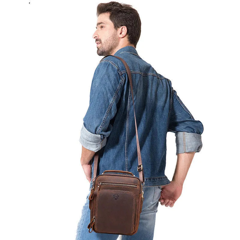 Men's brown crazy horse leather crossbody bag with single shoulder strap and sewing line details