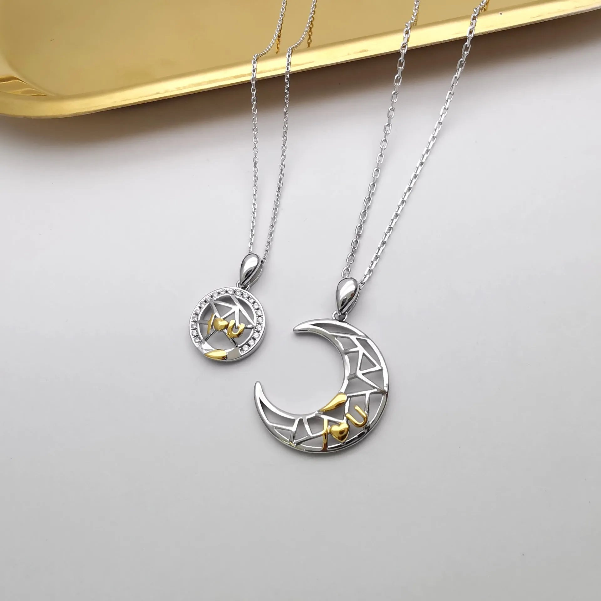 Sun Moon Tooth Couple Necklace with electroplated copper pendant and cross chain in celestial design