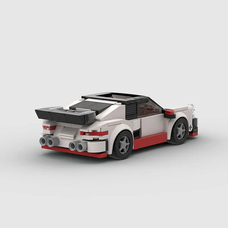 Small particle plastic building blocks model of a cool convertible sports car on a table