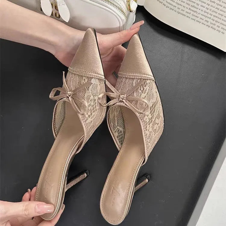 Women's light brown lace-up pointed toe high heels with a bowknot detail on the mesh upper.