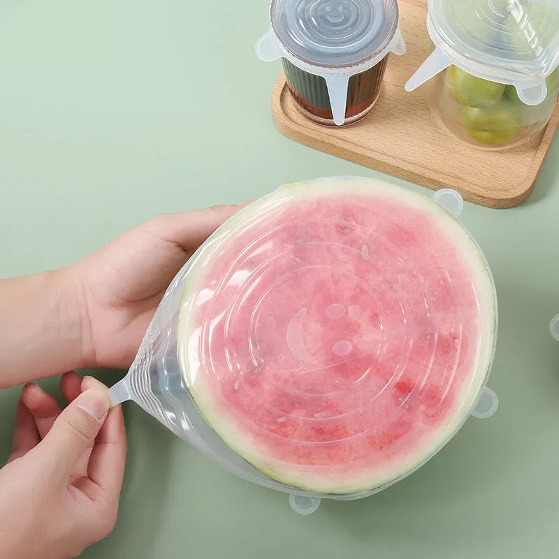 Six silicone stretch food cover lids in different sizes from 6.5cm to 20.5cm diameter